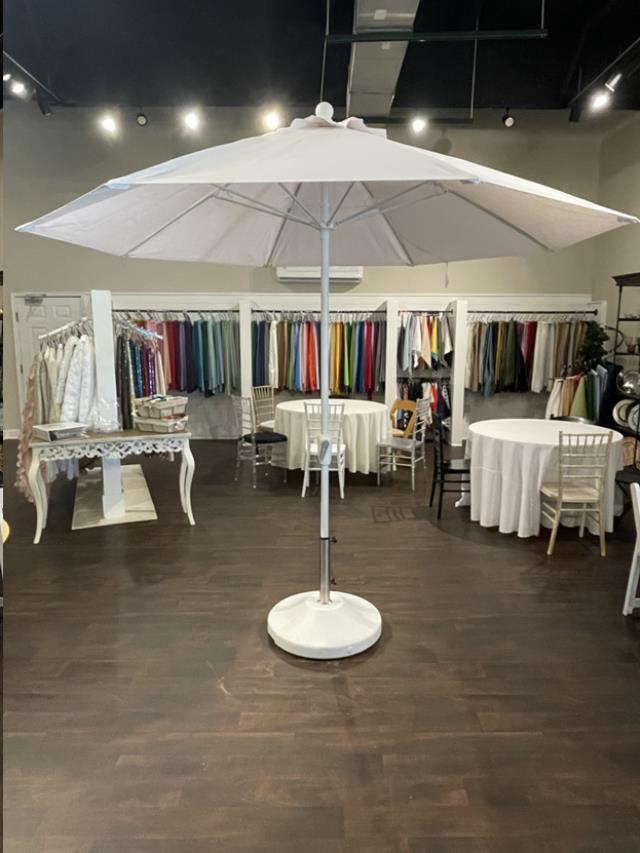 Where to rent 9  WHITE UMBRELLA W BASE in Mt. Airy NC